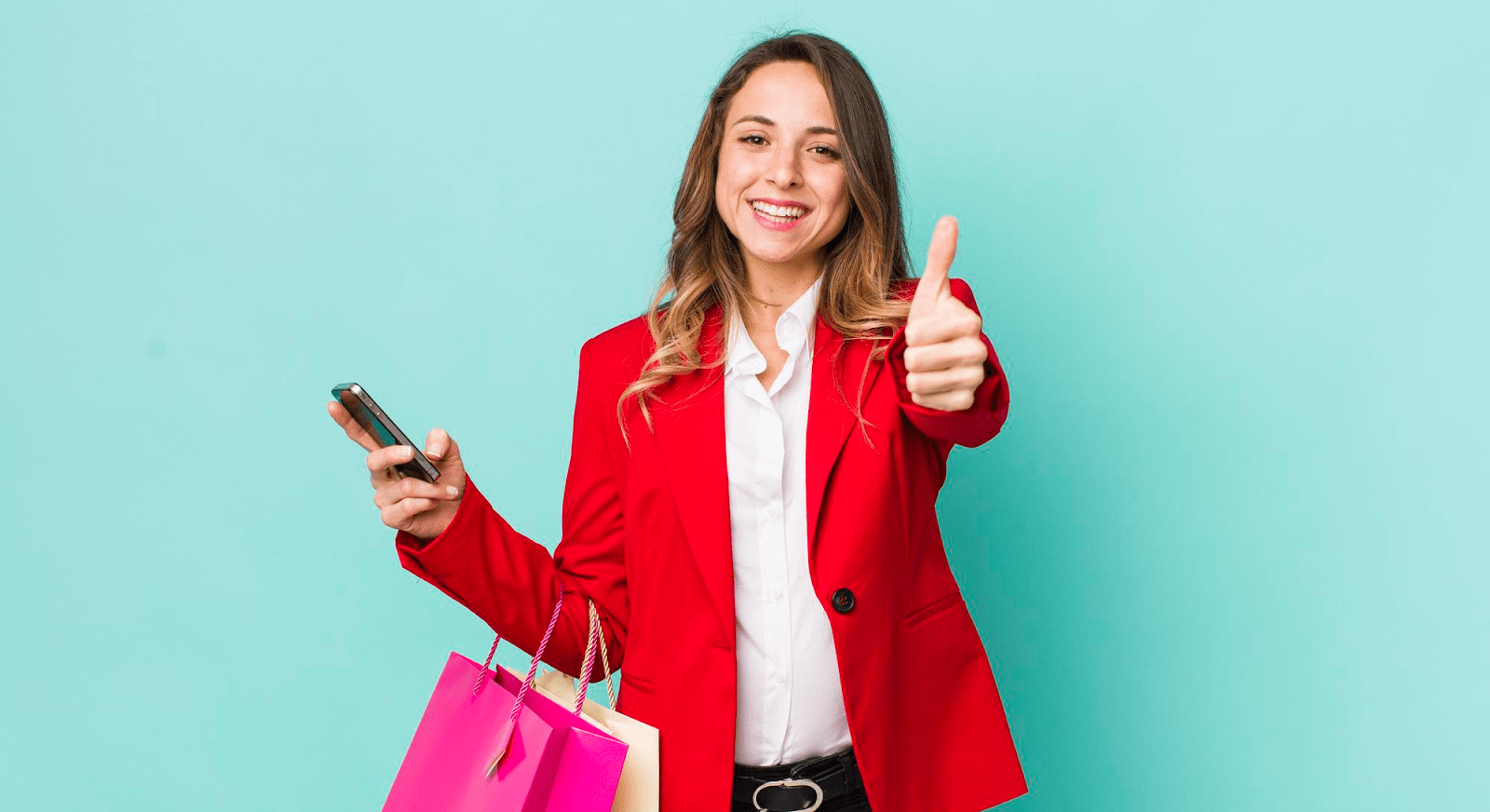 woman smiling and showing thumbs up