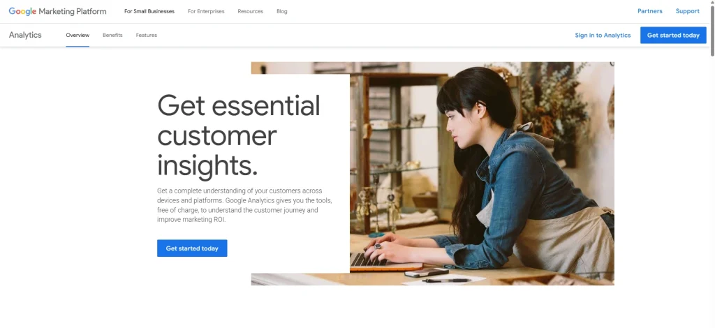 Google Marketing Platform Analytics overview page showing the headline “Get essential customer insights” beside a photo of a woman working on a laptop.