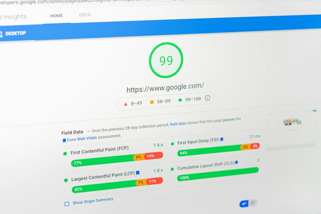 Screenshot of Google PageSpeed Insights showing a performance score of 99 with Core Web Vitals metrics, including First Contentful Paint, Largest Contentful Paint, First Input Delay, and Cumulative Layout Shift.
